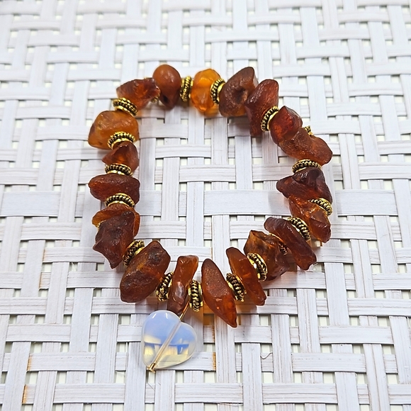 Hand Crafted Jewelry - Handmade amber beads, gold spacers and a heart moonstone